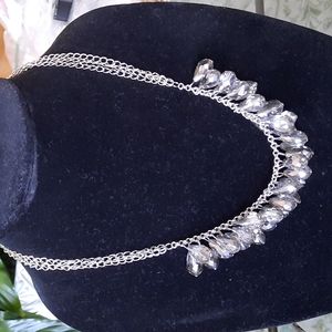 Gray faceted crystal necklace on triple pewter color silver chain.